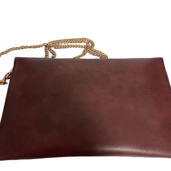Ophelia Roe Burgundy Grommet Clutch/Crossbody Sz 10”W x 6.5”T NWT - Picture 2 of 8